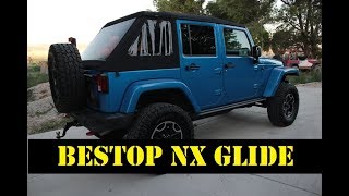 How to Install the Bestop NX Glide soft top for Jeep JKs [upl. by Boris]