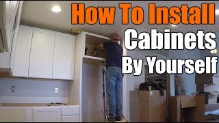 How To Install Upper Kitchen Cabinets By Yourself  THE HANDYMAN [upl. by Strage]