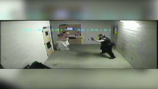 Florence jail inmate attacks officers while being released from custody [upl. by Auqinahc]