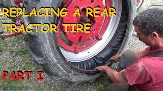 Replacing A Rear Tractor Tire  Rim Removal [upl. by Margarette376]